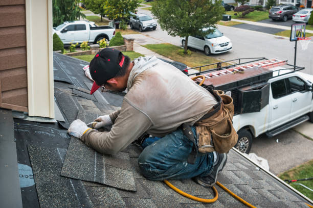 Professional Gutter Repair And Installation technician working in Cadogan, PA